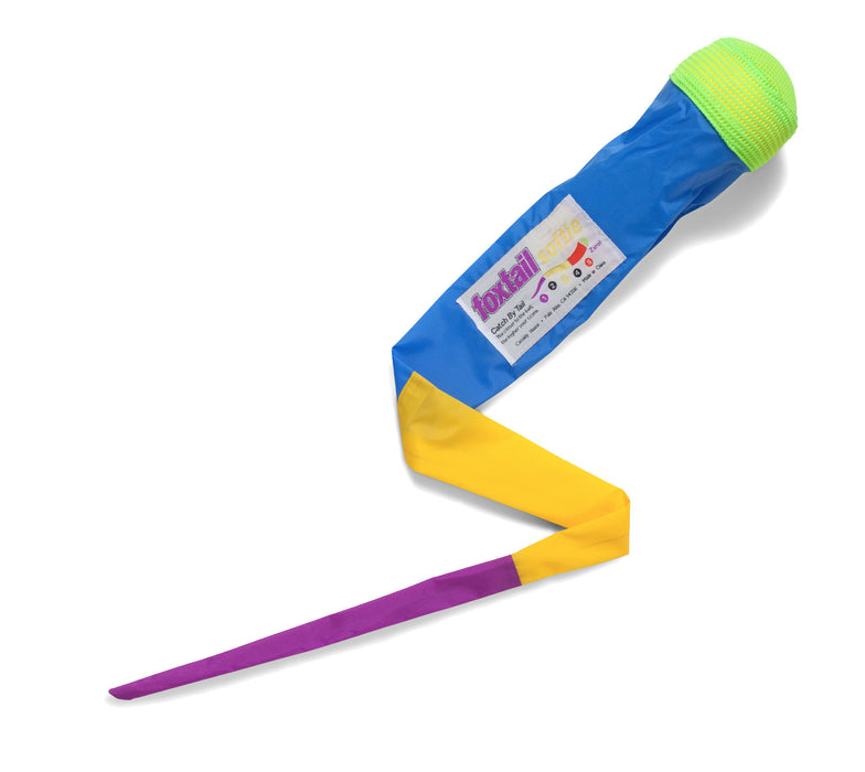 The Foxtail Softie is a colorful toy with a green foam ball and blue sleeve, plus a yellow and purple tail—ideal for safe throwing, catching, and building hand-eye coordination on a white background.
